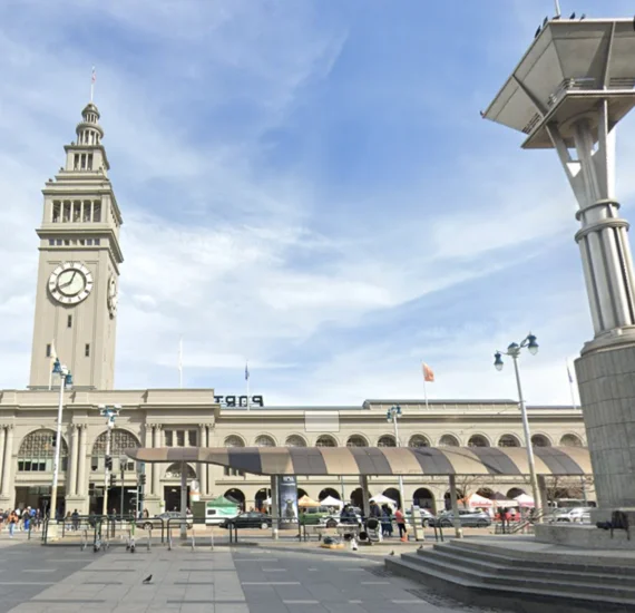 Harry Bridges Plaza on the Embarcadero, looking across the street to the Ferry Building clock tower